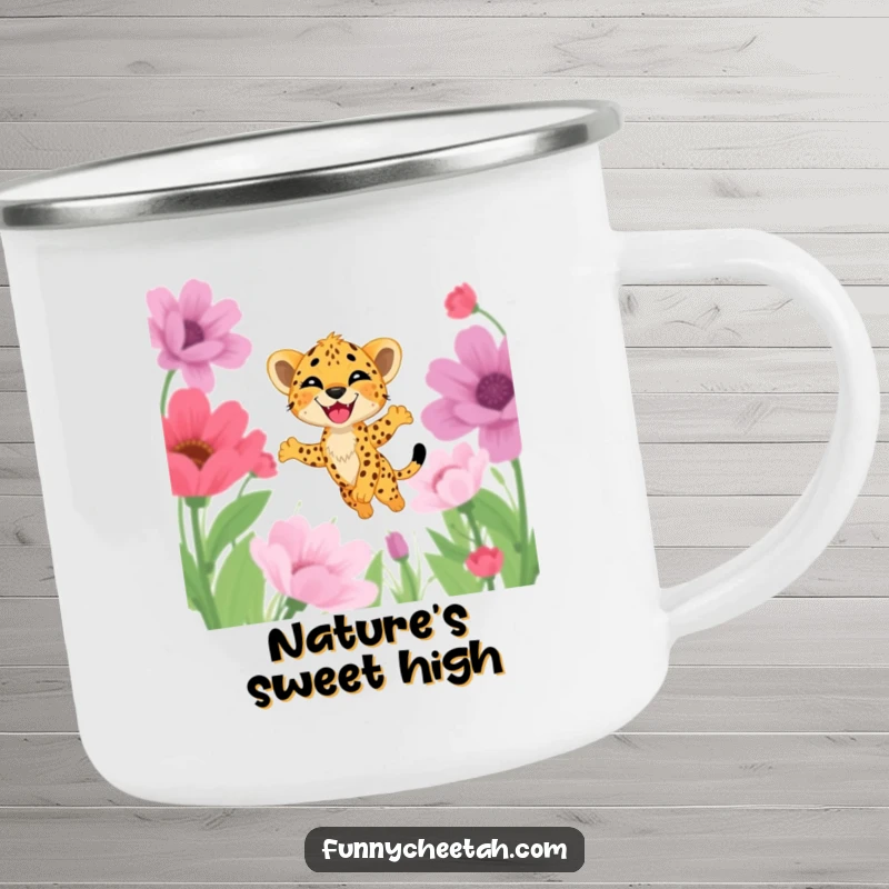 Funny camping mug showing a cheetah cub joyfully leaping through oversized flowers, ideal for outdoor enthusiasts who love nature and humor.