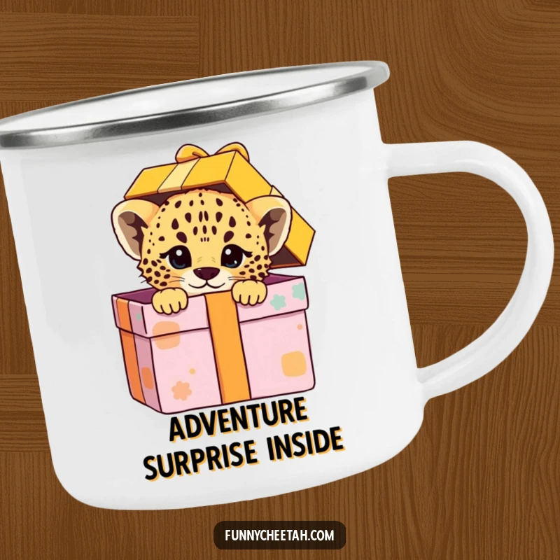 Funny camping mug showing a cheetah cub peeking playfully from a colorful gift box, ideal for outdoor enthusiasts who love a delightful surprise.