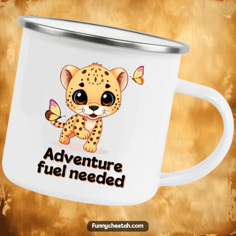Funny camping mug showcasing a curious cheetah cub in a playful chase after a butterfly, perfect for outdoor enthusiasts who love a laugh.