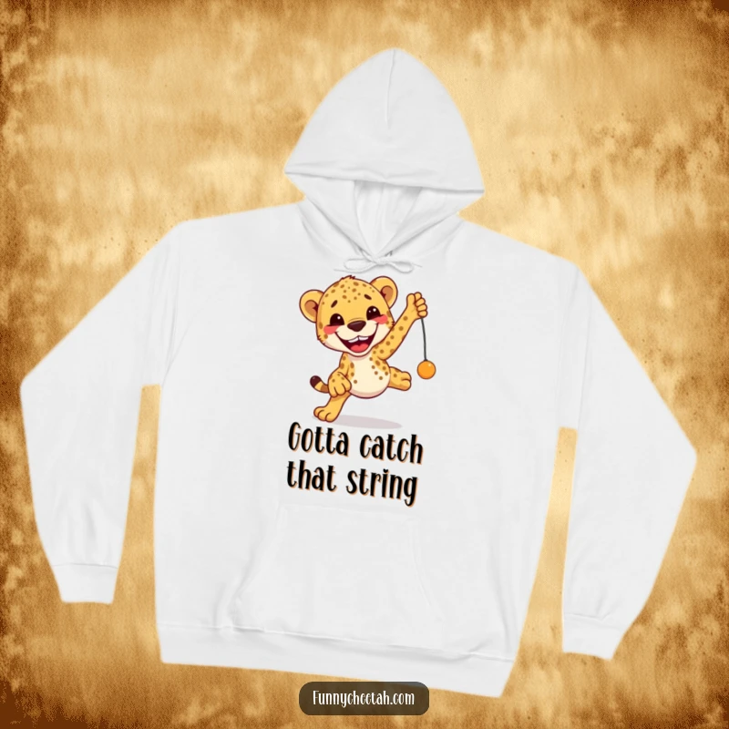 Funny Cheetah Hoodie featuring a cheetah with an excited grin leaping enthusiastically towards a dangling toy, designed for cozy fun.