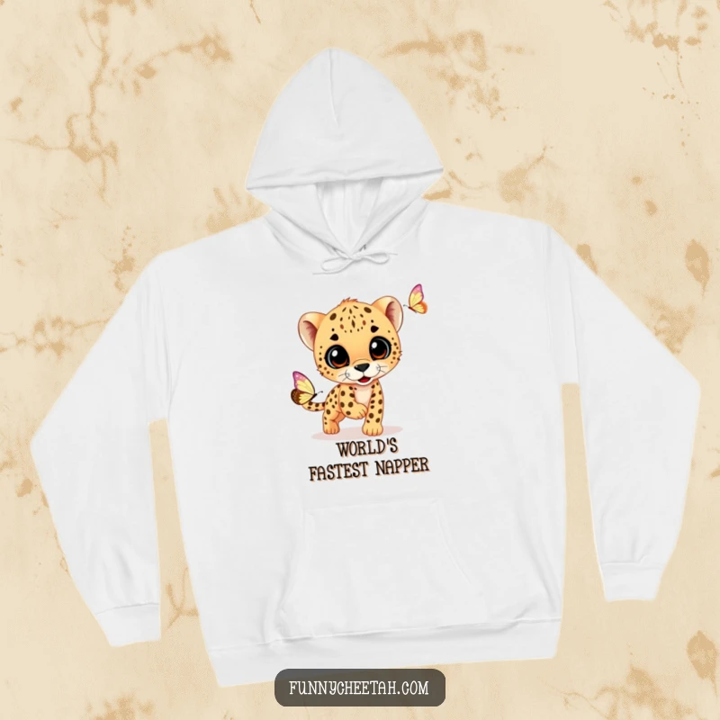 Funny hoodie with a snuggly cheetah cub intently chasing a shiny butterfly, radiating warmth, cuteness, and playful outdoor adventure.