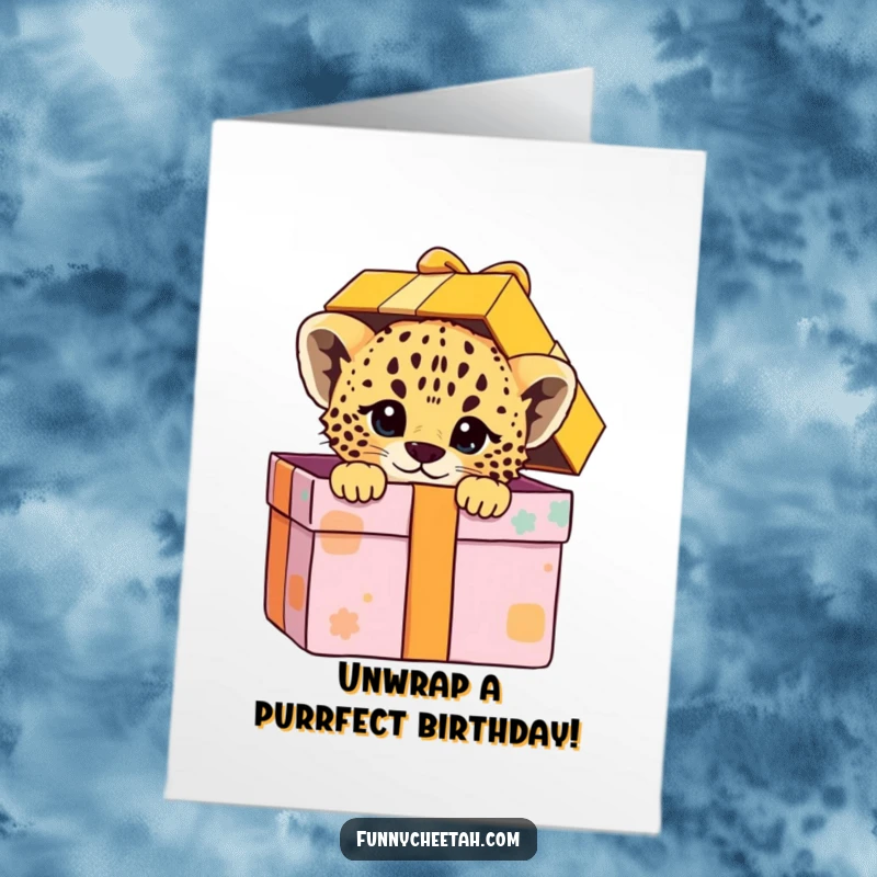Funny Free Printable Cheetah Cub Birthday Card: Cub peeks playfully from an oversized colorful gift box, ready to celebrate.