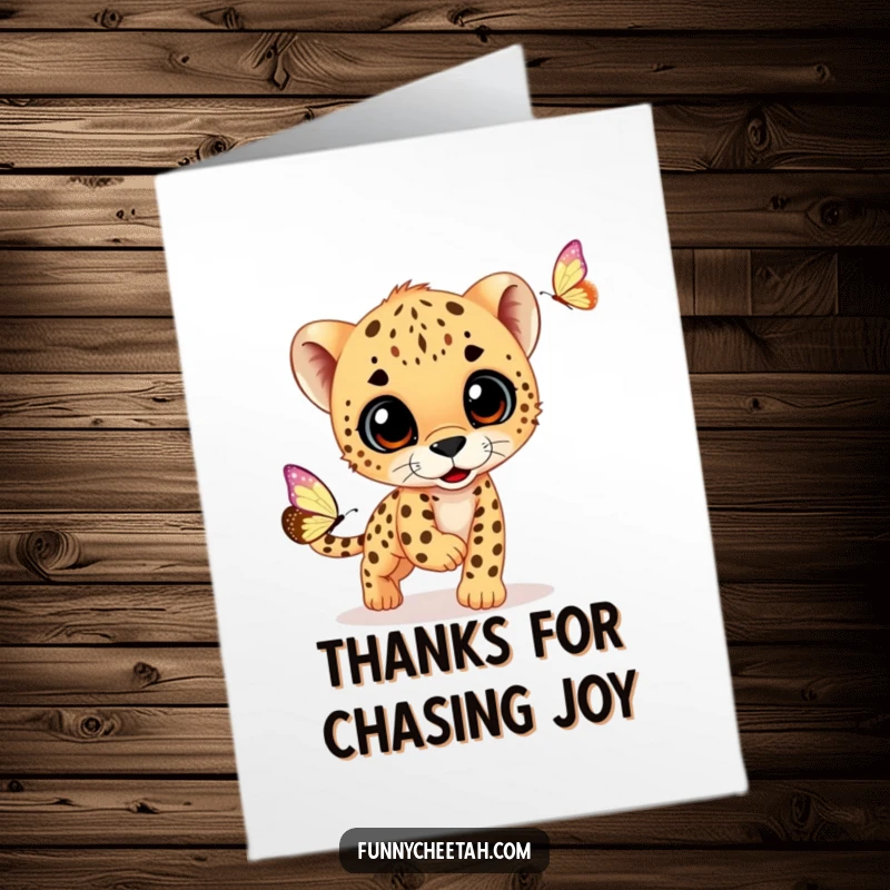 Funny Free Printable Cheetah Cub Thank You Card: Adorable cub playfully chases a butterfly to express thanks.